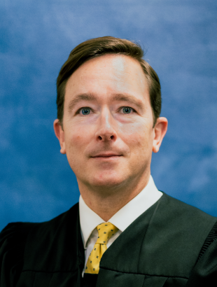 Circuit Judge Chad K. Alvaro