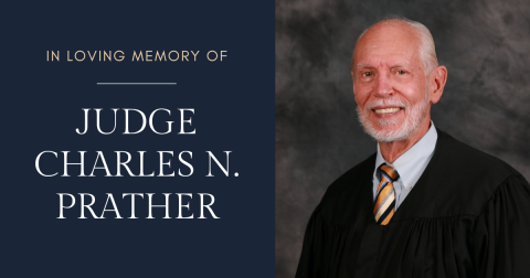 A photo of Judge Prather with the message in loving memory.